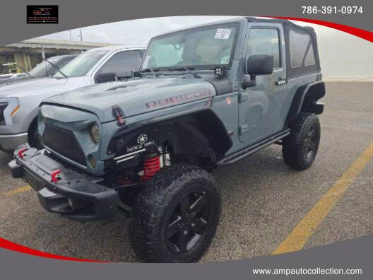 2013 Jeep Wrangler for sale at Amp Auto Collection in Fort Lauderdale FL