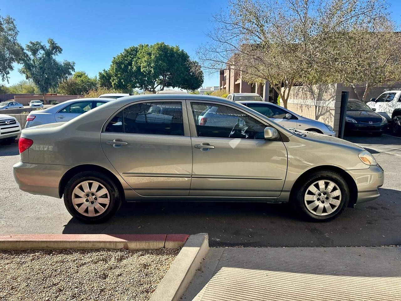 2003 Toyota Corolla for sale at HUDSONS AUTOS in Gilbert, AZ