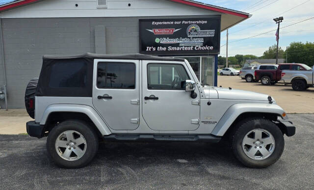 2011 Jeep Wrangler Unlimited for sale at Bastian s Auto Outlet in Coal Valley, IL