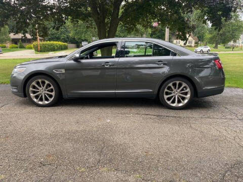 2015 Ford Taurus for sale at Bowlings Used Cars in Canton OH