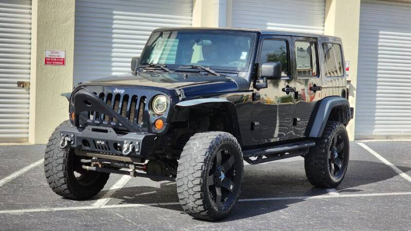 2009 Jeep Wrangler Unlimited for sale at Maxicars Auto Sales in West Park FL
