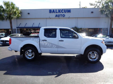 2012 Nissan Frontier for sale at BALKCUM AUTO INC in Wilmington NC
