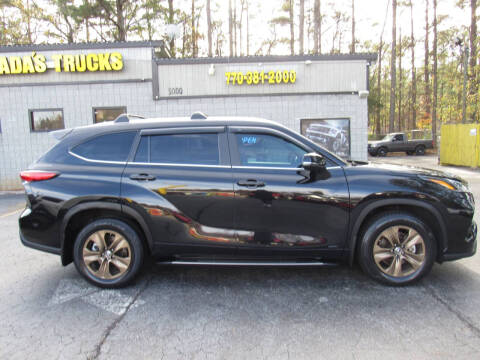 2023 Toyota Highlander Hybrid Bronze Edition