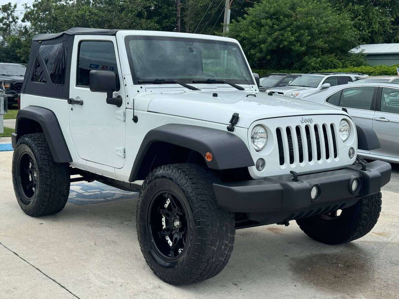 2014 Jeep Wrangler for sale at DJA Autos Center in Orlando, FL