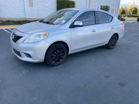 2012 Nissan Versa for sale at E and M Auto Sales in Bloomington CA