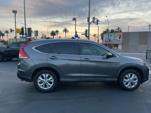 2014 Honda CR-V for sale at La Mesa Auto Sales in Huntington Park CA