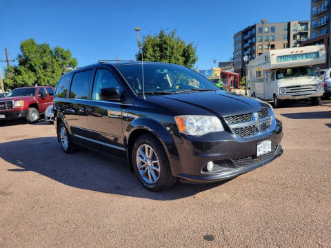 2014 Dodge Grand Caravan for sale at BERKENKOTTER MOTORS in Brighton CO