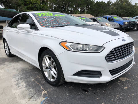 2014 Ford Fusion for sale at RIVERSIDE MOTORCARS INC - Main Lot in New Smyrna Beach FL