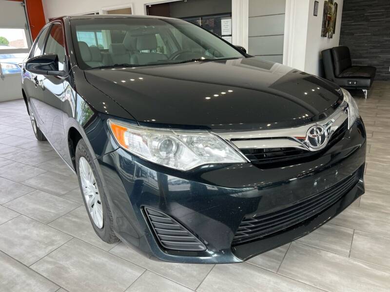 2012 Toyota Camry for sale at Evolution Autos in Whiteland IN