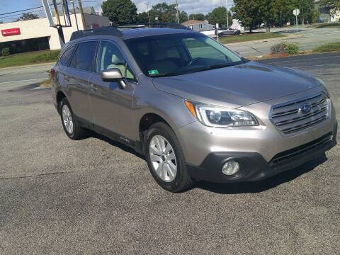 2015 Subaru Outback for sale at MIRACLE AUTO SALES in Cranston RI
