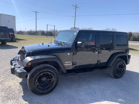 2013 Jeep Wrangler Unlimited for sale at Superior Used Cars LLC in Claremore OK