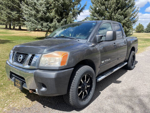 2011 Nissan Titan for sale at BELOW BOOK AUTO SALES in Idaho Falls ID