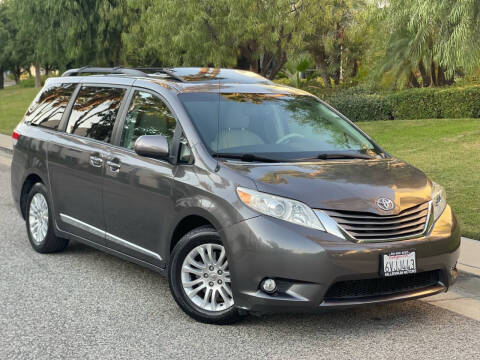 2012 Toyota Sienna for sale at MILLENNIUM MOTORS in Van Nuys CA