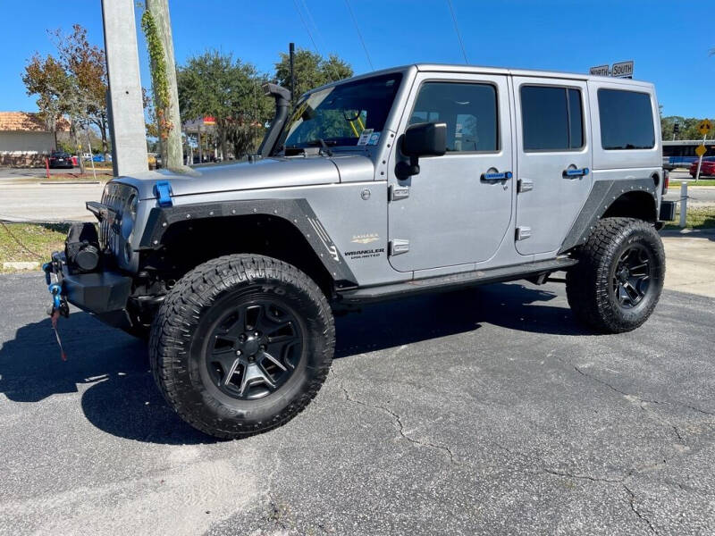 2015 Jeep Wrangler Unlimited for sale at Blum's Auto Mart in Port Orange FL