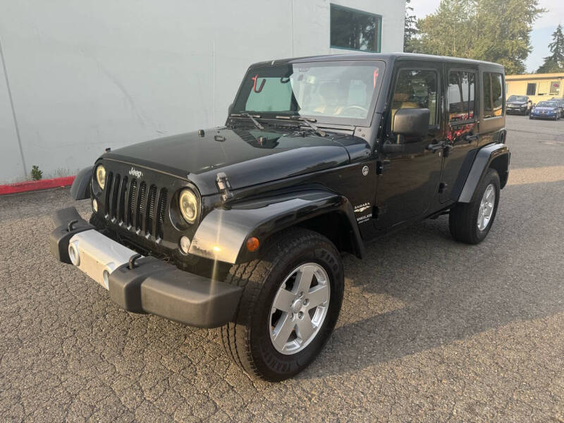 Used 2015 Jeep Wrangler Unlimited Sahara with VIN 1C4BJWEG7FL722622 for sale in Kirkland, WA