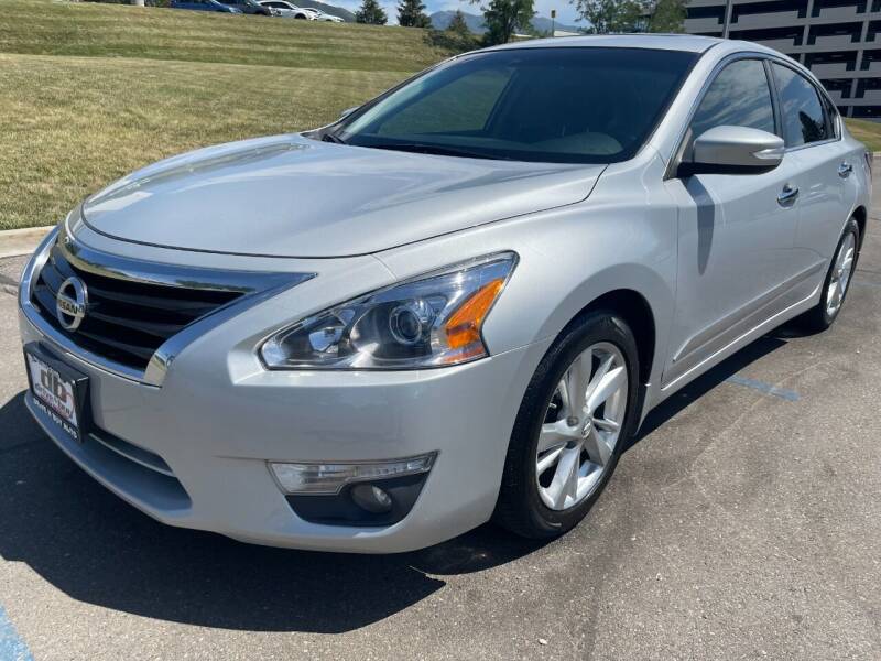 2015 Nissan Altima for sale at DRIVE N BUY AUTO SALES in Ogden UT