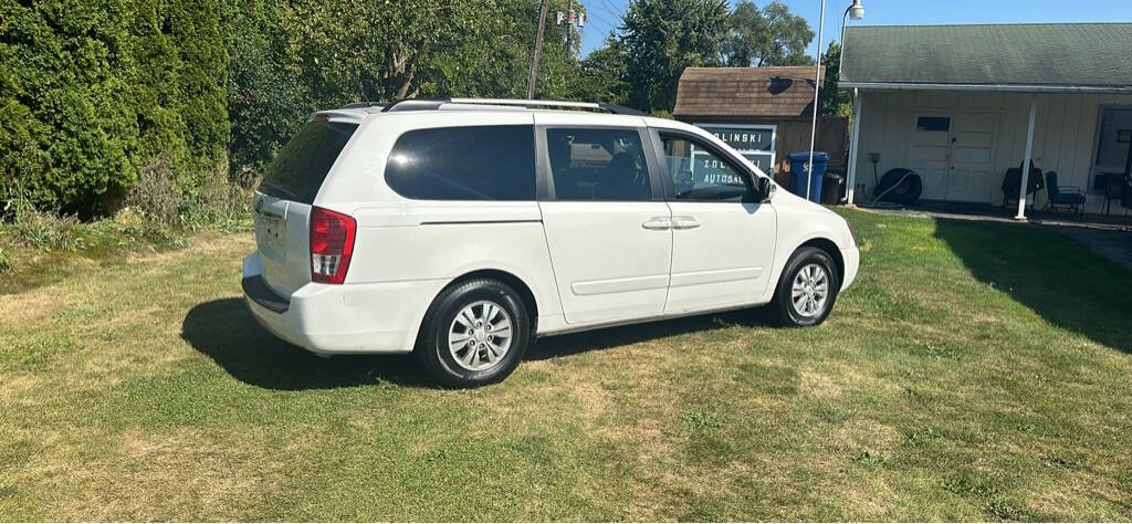 2012 Kia Sedona for sale at Zolinski Auto Sale in Saginaw, MI