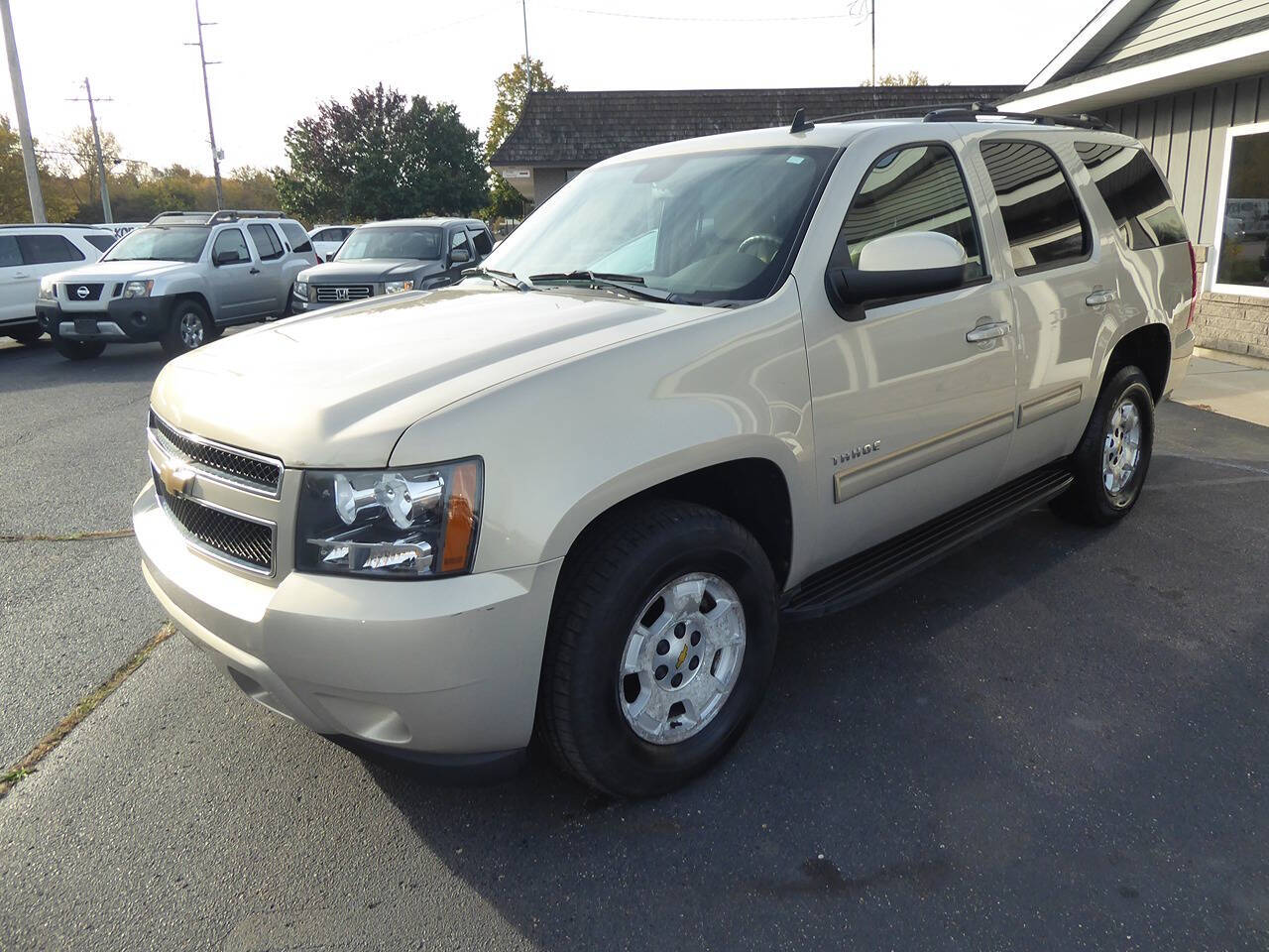 2011 Chevrolet Tahoe for sale at Lakeshore Autos in Holland, MI