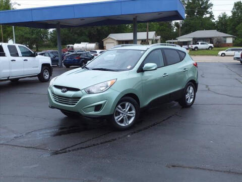 2011 Hyundai Tucson for sale at HOWERTON'S AUTO SALES in Stillwater OK