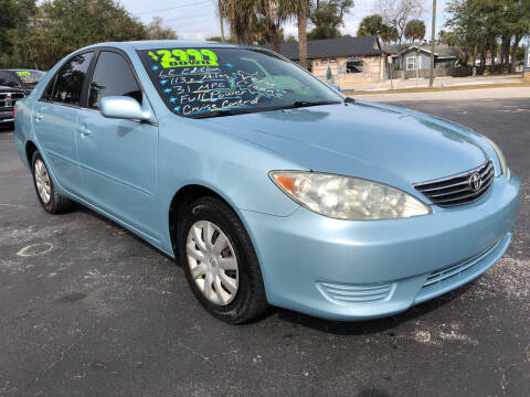 2005 Toyota Camry for sale at RIVERSIDE MOTORCARS INC - Main Lot in New Smyrna Beach FL