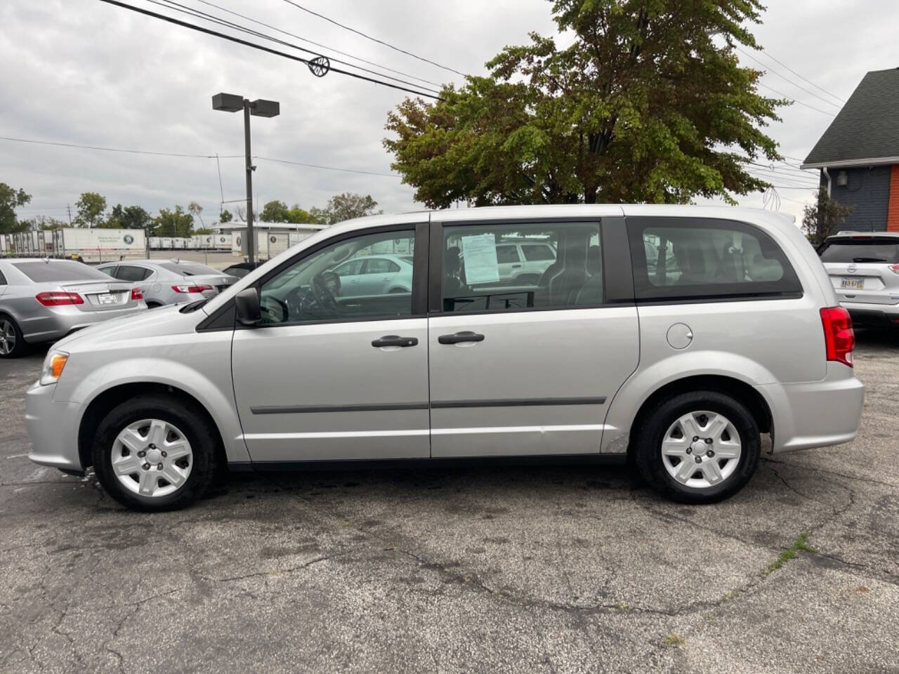 2012 Dodge Grand Caravan for sale at AVS AUTO GROUP LLC in CLEVELAND, OH