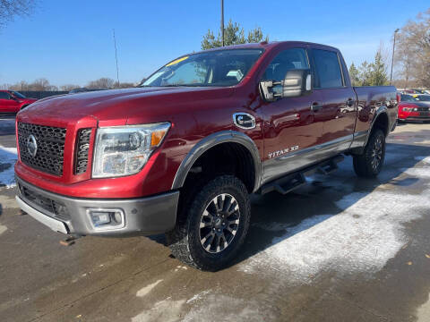 2017 Nissan Titan XD for sale at Azteca Auto Sales LLC in Des Moines IA