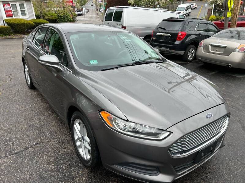 2013 Ford Fusion for sale at Charlie's Auto Sales in Quincy MA