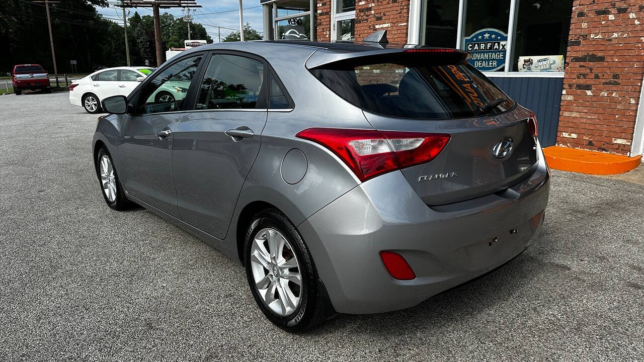 2013 Hyundai ELANTRA GT for sale at North Ridge Auto Center LLC in Madison, OH