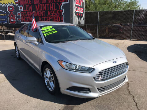 2013 Ford Fusion for sale at ROCK STAR TRUCK & AUTO LLC in Las Vegas NV