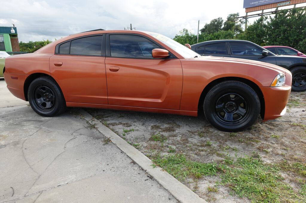 2014 Dodge Charger for sale at Warren's Auto Sales, Inc. in Lakeland, FL