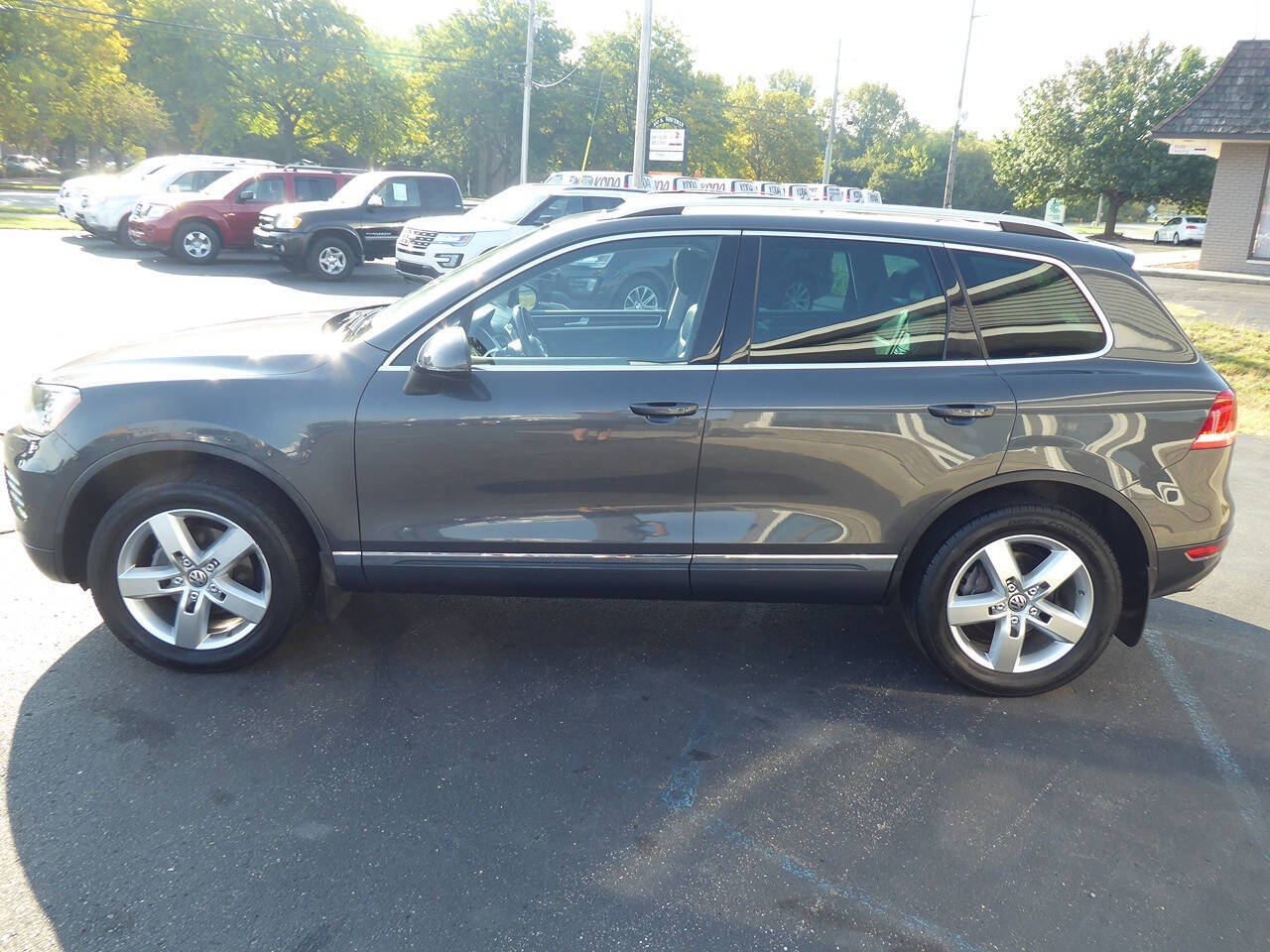 2014 Volkswagen Touareg for sale at Lakeshore Autos in Holland, MI