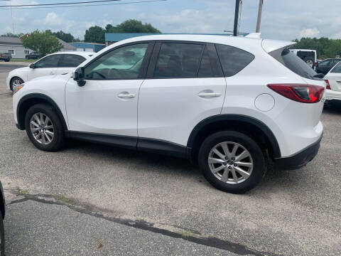 2014 Mazda CX-5 for sale at BAY CITY MOTORS in Auburn ME