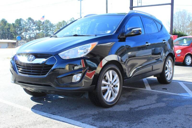 2012 Hyundai Tucson for sale at Wallace & Kelley Auto Brokers in Douglasville GA