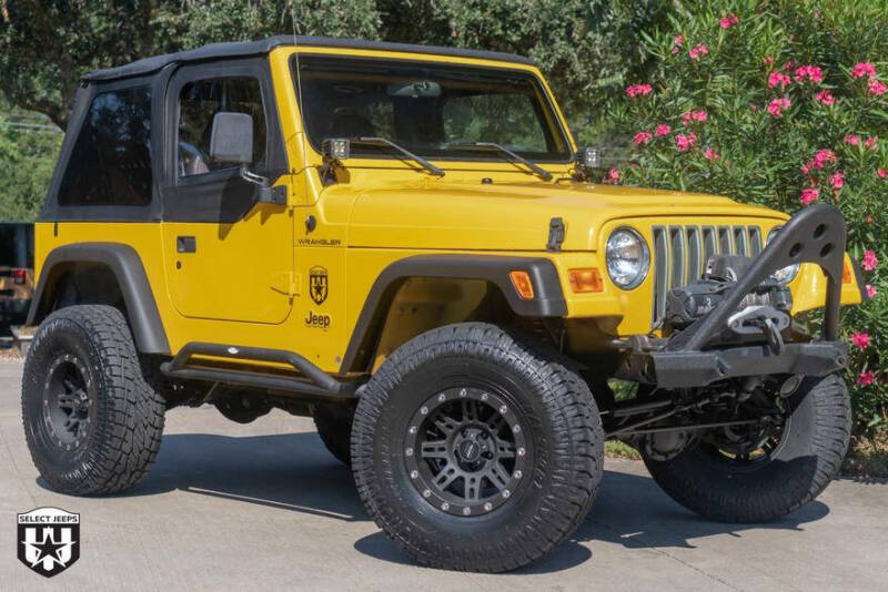 2002 Jeep Wrangler for sale at SELECT JEEPS INC in League City TX