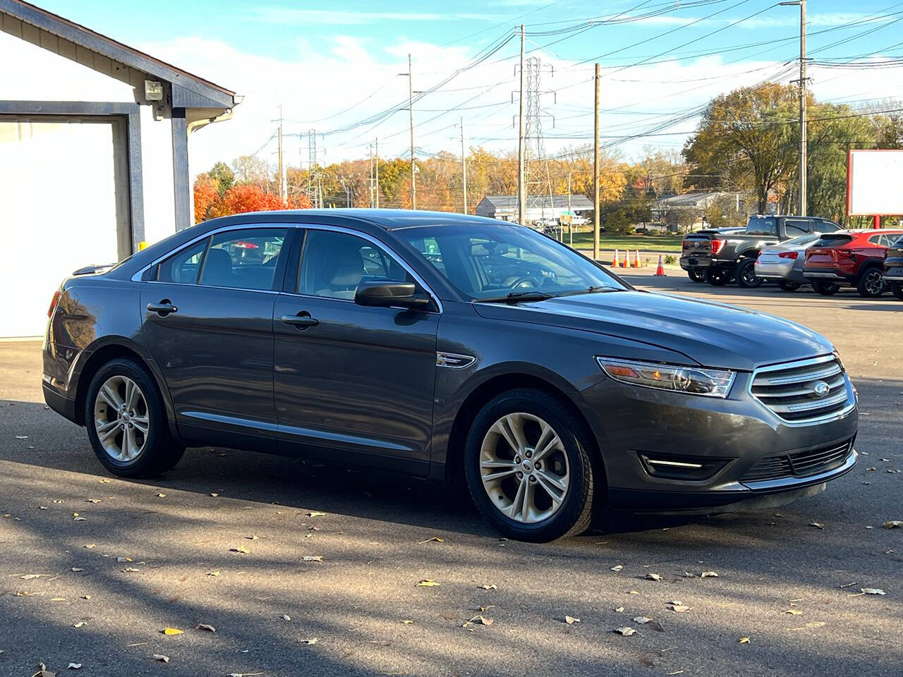 2015 Ford Taurus for sale at Spartan Elite Auto Group LLC in Lansing, MI