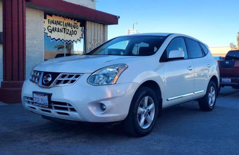 2013 Nissan Rogue for sale at Driven Auto Sales in Coachella CA