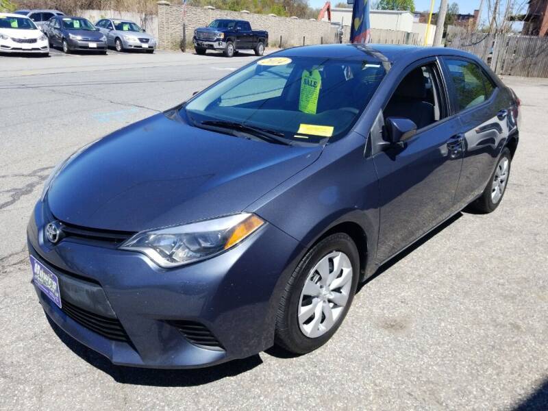 2014 Toyota Corolla for sale at Howe's Auto Sales in Lowell MA
