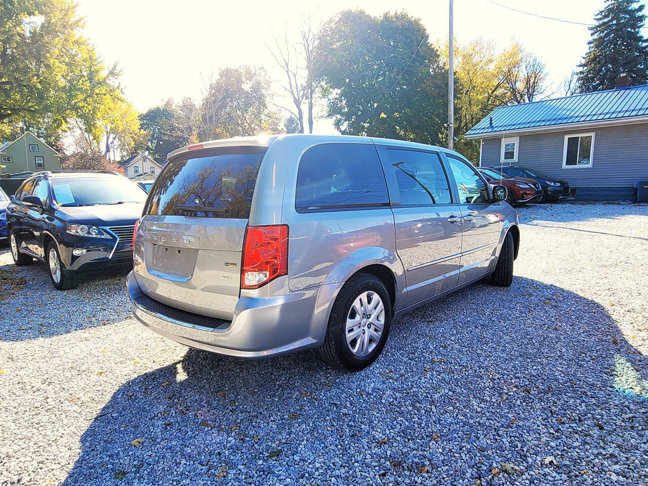 2014 Dodge Grand Caravan for sale at Statewide Auto LLC in Akron, OH