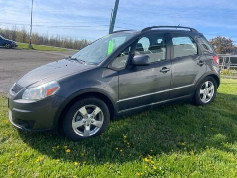 2012 Suzuki SX4 Crossover for sale at FUSION AUTO SALES in Spencerport NY
