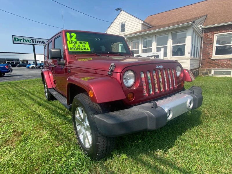 Used 2012 Jeep Wrangler Unlimited Sahara with VIN 1C4BJWEG4CL167057 for sale in New Castle, DE