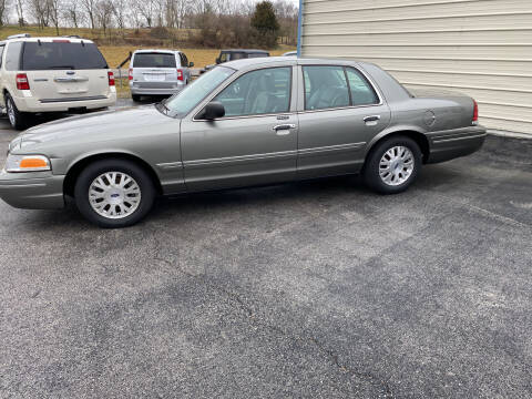 2004 Ford Crown Victoria for sale at K & P Used Cars, Inc. in Philadelphia TN