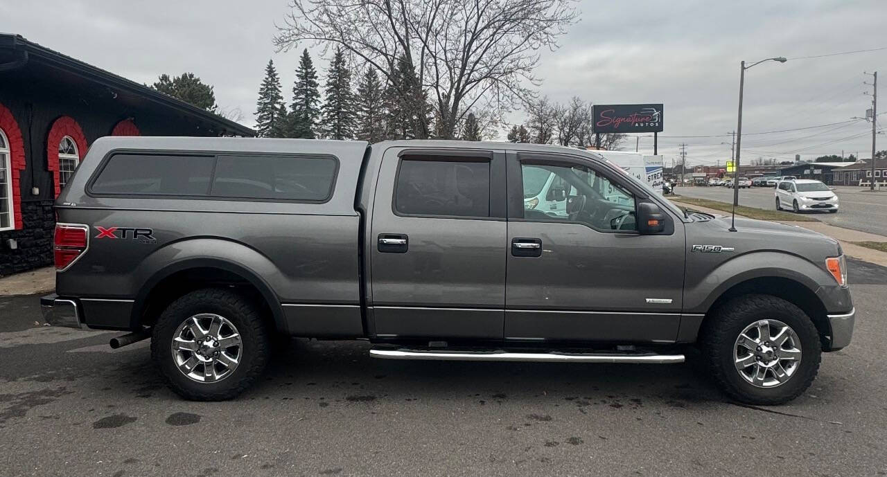 2014 Ford F-150 for sale at SIGNATURE AUTOS LLC in Weston, WI