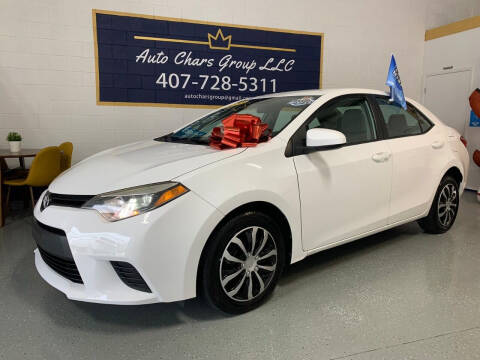 2014 Toyota Corolla for sale at Auto Chars Group LLC in Orlando FL