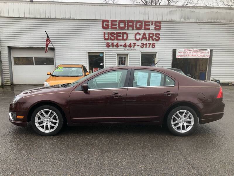 2012 Ford Fusion for sale at George's Used Cars Inc in Orbisonia PA