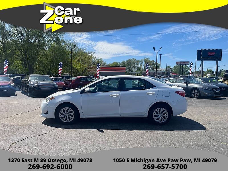 2019 Toyota Corolla for sale at Car Zone in Otsego MI