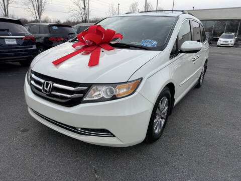 2014 Honda Odyssey for sale at Charlotte Auto Group, Inc in Monroe NC