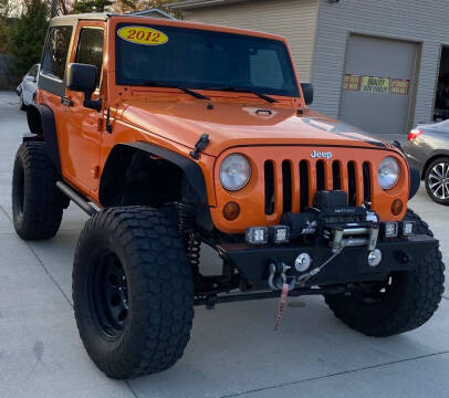 2012 Jeep Wrangler for sale at Rigo's Auto Sales, Inc. in Lafayette IN