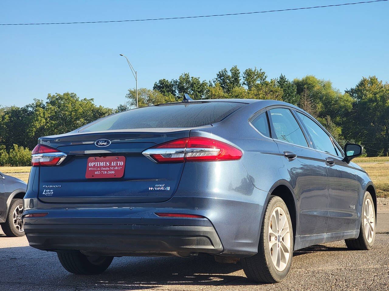 2019 Ford Fusion Hybrid for sale at Optimus Auto in Omaha, NE