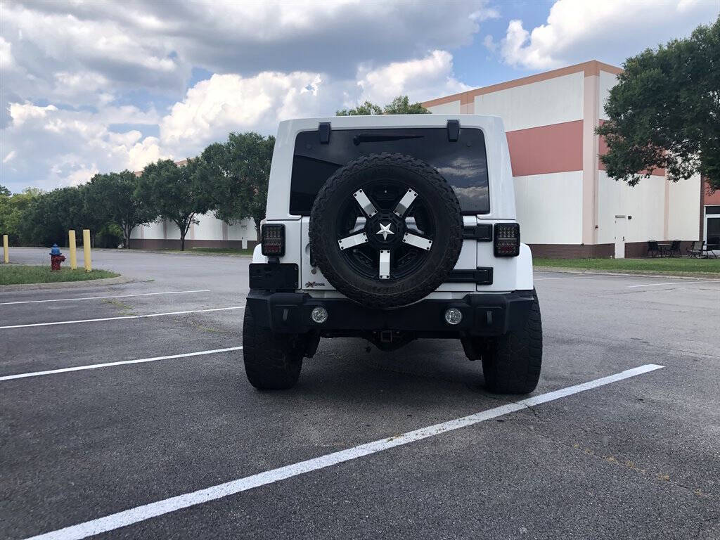 2014 Jeep Wrangler Unlimited for sale at American Customs Llc in Franklin, TN