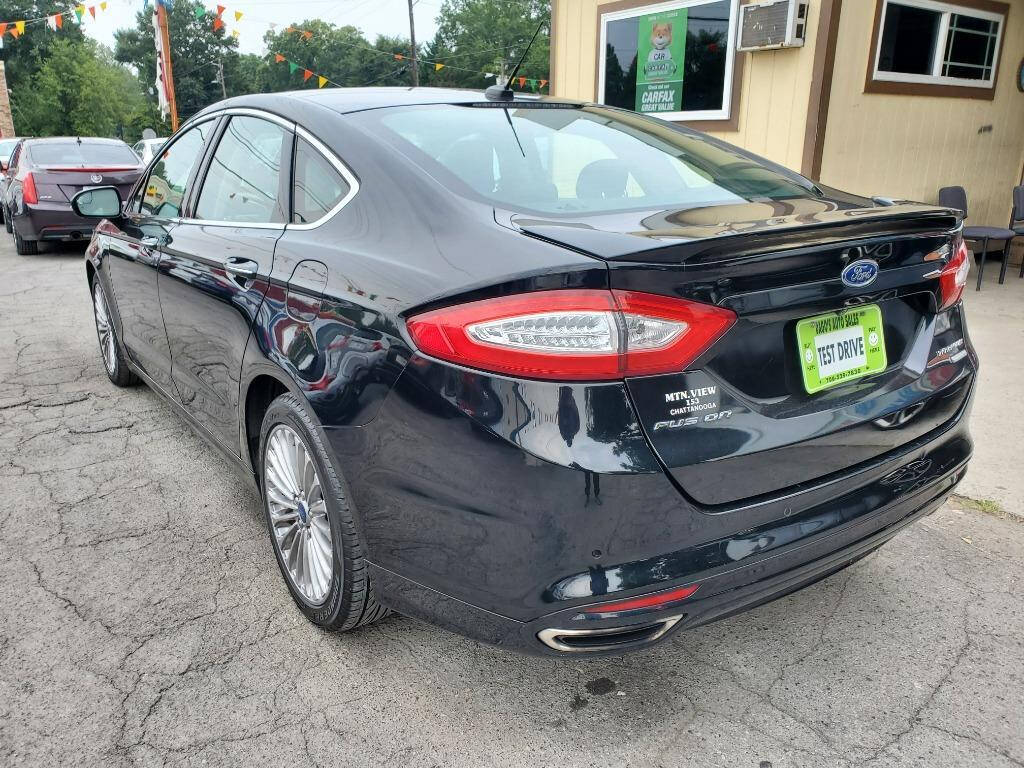 2016 Ford Fusion for sale at DAGO'S AUTO SALES LLC in Dalton, GA